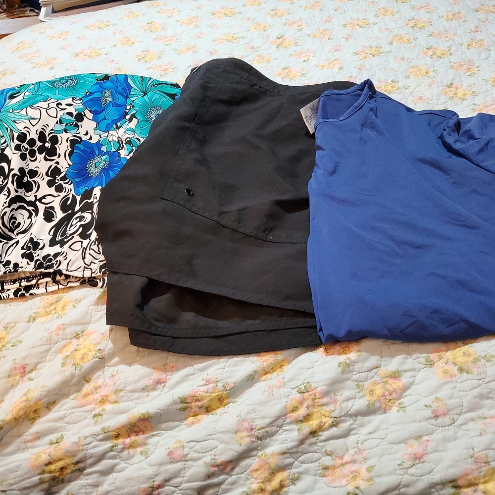 1 pair swim shorts , 1 swim top  and 1 swim tee sold as one lot